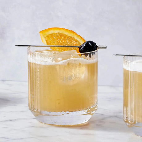 Whiskey Sour with lemon and a foamy top