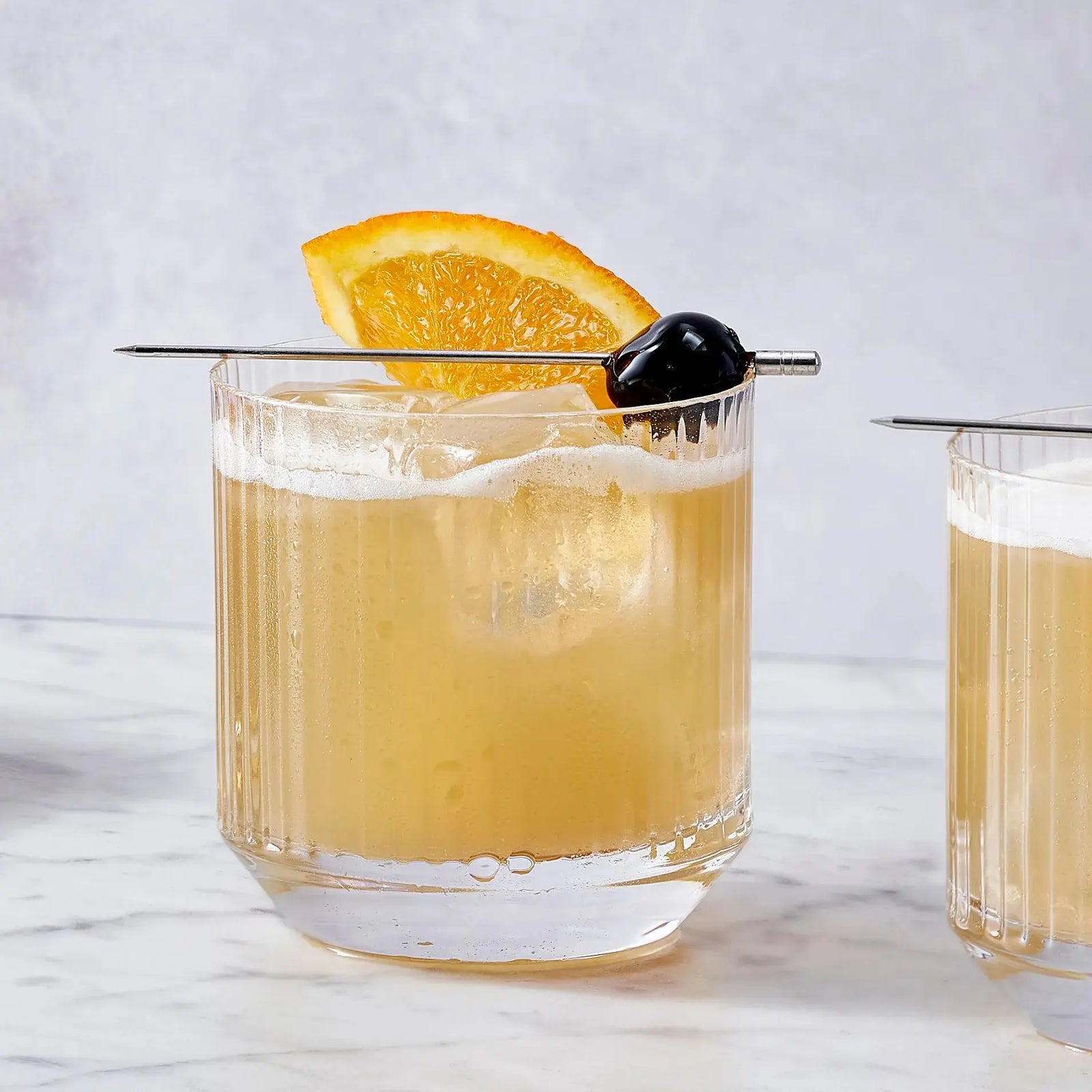 Whiskey Sour with lemon and a foamy top