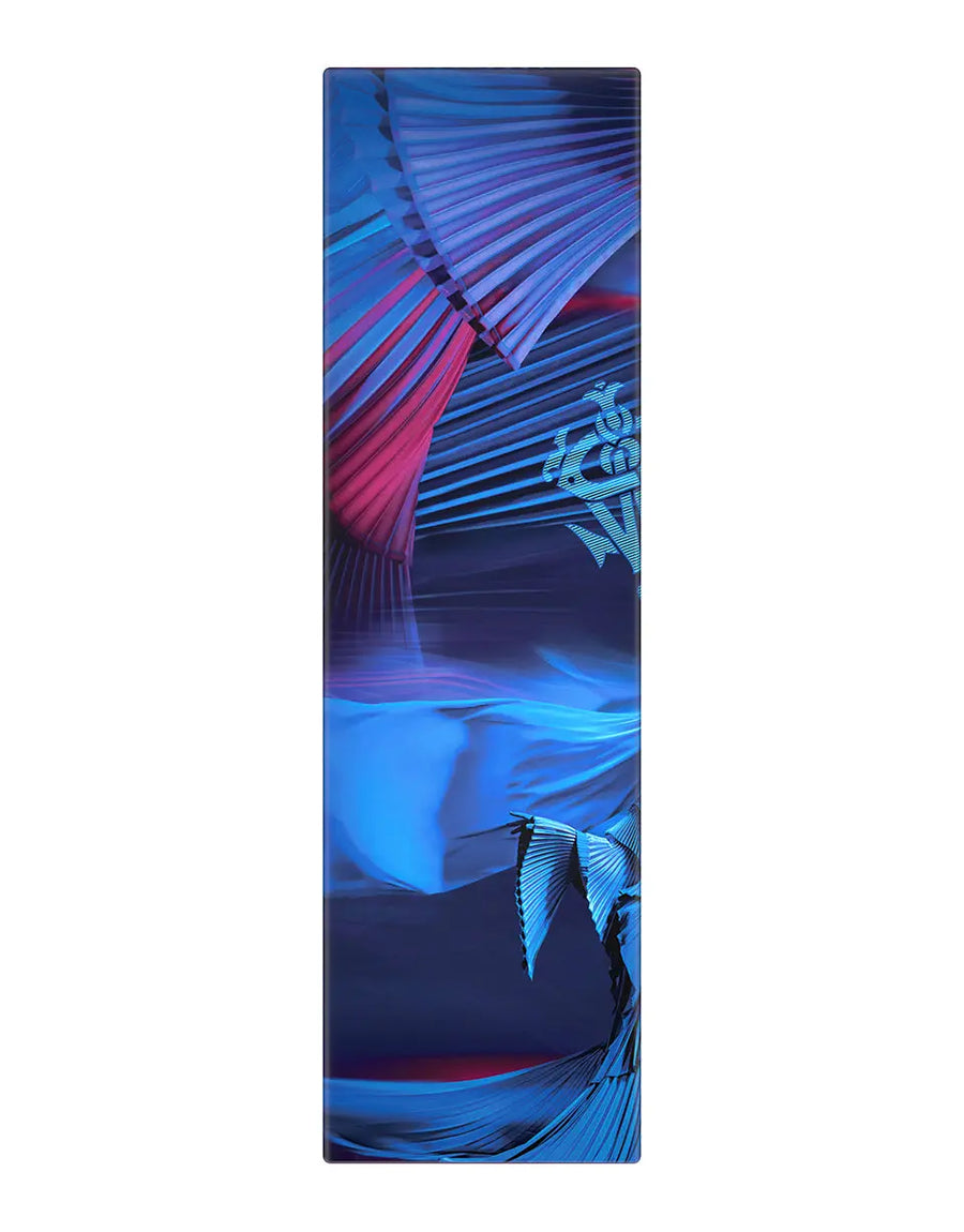 Yoga mat with colorful leaf design on a white background