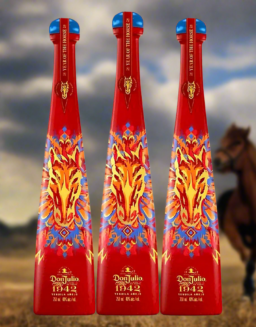 Three red bottles with fiery design and 'Don Julio' branding against a blurred background of a horse.